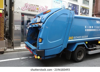 Tokyo, Japan - August 15 2022: Back Of A Japanese Blue Garbage Truck. 