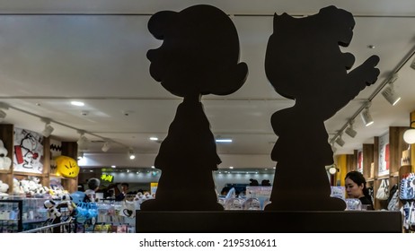 Tokyo, Japan - August 2018: Lucy And Charlie Brown Silhouettes Inside Snoopy Town Toy Store In Tokyo