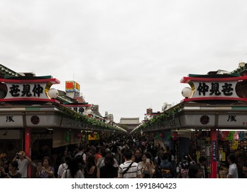 Tokyo, Japan - august 22 2019: Lots of people walking by Nakamise street at the buddhist Sensō-ji  temple