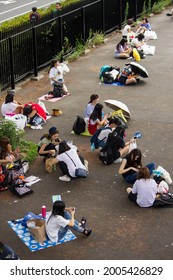 Tokyo, Japan - August 22 2019: Girls Waiting For A Concert Outside Of Yoyogi National Gymnasium