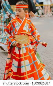 TOKYO, JAPAN - AUGUST 25 2019: Japanese Child In Yukata Dancing During Harajuku Genki Matsuri Super Yosakoi Festival, A Annual Free Public Event. Yosakoi Is A Unique Style Of Japanese Dance. 