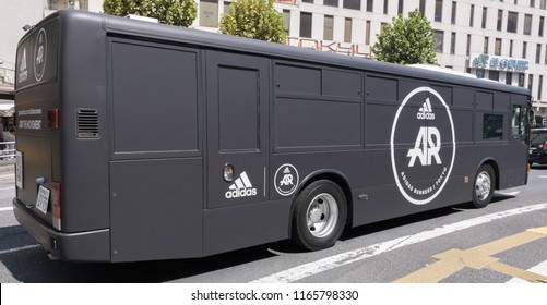 TOKYO, JAPAN - AUGUST 25TH, 2018. Adidas Runners Running Movement Campaign Advertisement Bus Making It Rounds In Shibuya Street.