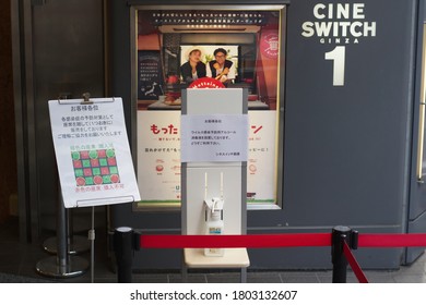 TOKYO, JAPAN - August 26, 2020: Front Of Cine Switch, An Art House Cinema In Ginza, With Hand Sanitizer & A Seating Chart Showing Social Distancing Arrangement During Coronavirus Outbreak.