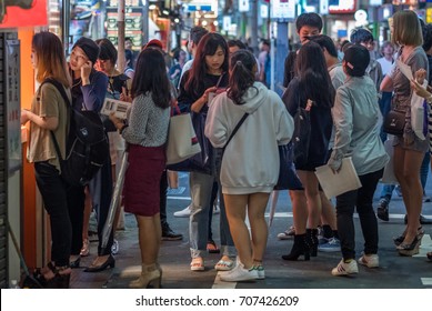 TOKYO, JAPAN - AUGUST 31ST, 2017. Crowd At A Street Food Vendor In Shibuya At Night.