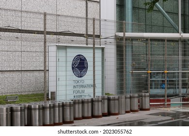 TOKYO, JAPAN - August 7, 2021: Sign Behind Metal Fences At The Tokyo International Forum, The Olympic Weightlifting Venue, During Tokyo Olympics.