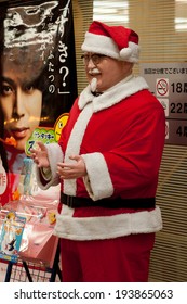 TOKYO JAPAN,  CIRCA 2010  Colonel Sanders Dressed as Santa Claus Circa 2010 in Tokyo Japan. Chicken Store does a brisk business on Christmas Day ( not a holiday)