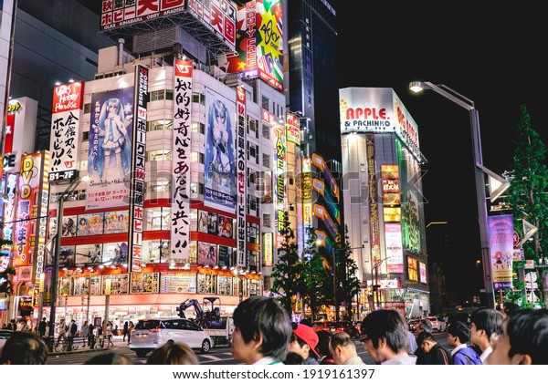 Tokyo,\
Japan - Circa 2015: Akihabara streets, his colorful lights in otaku\
stores and restaurants by night and japanese\
crowd