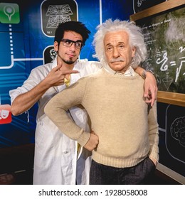 Tokyo, Japan - Circa 2015: Happy Young Traveler With Albert Einstein Wax Sculpture At Madame Tussauds Museum In Odaiba