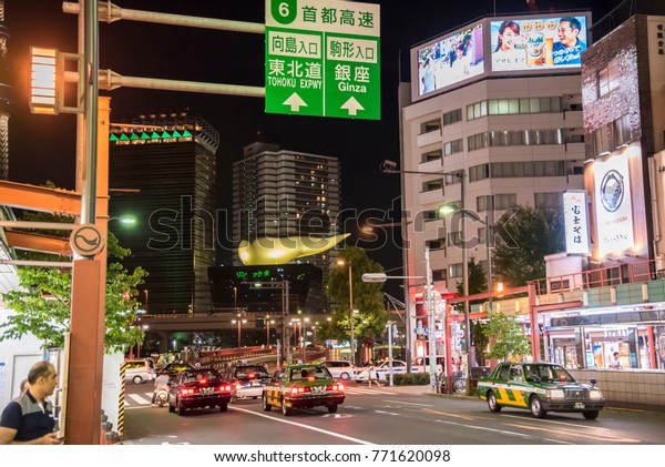 Tokyo, Japan – CIRCA September 2016: Traffic in\
Asakusa by night