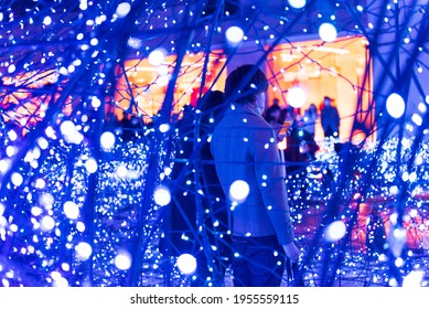 Tokyo, Japan - December 09, 2015: Visitors Adore The Christmas  Lights At Caretta Shopping Mall In Tokyo, Japan. 