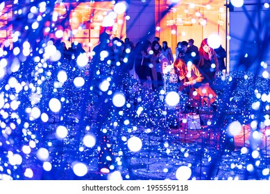 Tokyo, Japan - December 09, 2015: Visitors Adore The Christmas  Lights At Caretta Shopping Mall In Tokyo, Japan. 