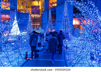 Tokyo, Japan - December 09, 2015: Visitors Adore The Christmas  Lights At Caretta Shopping Mall In Tokyo, Japan. 