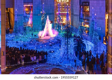 Tokyo, Japan - December 09, 2015: Visitors Adore The Christmas  Lights At Caretta Shopping Mall In Tokyo, Japan. 