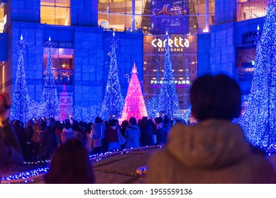 Tokyo, Japan - December 09, 2015: Visitors Adore The Christmas  Lights At Caretta Shopping Mall In Tokyo, Japan. 