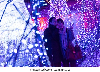 Tokyo, Japan - December 09, 2015: Visitors Adore The Christmas  Lights At Caretta Shopping Mall In Tokyo, Japan. 