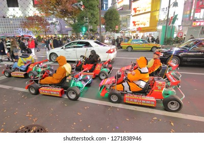 TOKYO JAPAN - DECEMBER 12, 2018: Unidentified People Ride Go Kart At Shibuya Scramble Crossing  In Tokyo Japan.