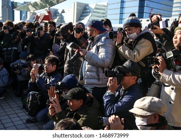 Tokyo, Japan - December 2017: Cosplayer Surrounded By Photographers At Comiket 93