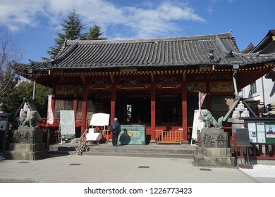 Tokyo, Japan, Feb. 24, 2017, Asakusa Jinja Shrine. A Man Pray Piously In Front Of The Asakusa Jinja Shrine.