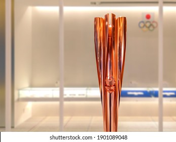 tokyo, japan - january 15 2020: Close up on the torch of the Tokyo 2020 Paralympic Games used during the tokyo 2020 olympic torch relay exhibited in the free access hall of Japan Olympic Museum.