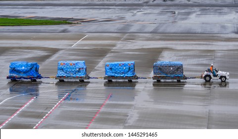 Tokyo, Japan - Jul 4, 2019. Cargo Service And Airport Baggage Loader Cart At Narita Airport (NRT). Narita Serves More Than 40 Million Passengers In 2018.