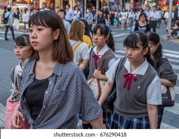 TOKYO, JAPAN - JULY 10TH, 2017. Crowd of people in the streets of Ikebukuro, a commercial and entertainment district in Toshima, Tokyo.