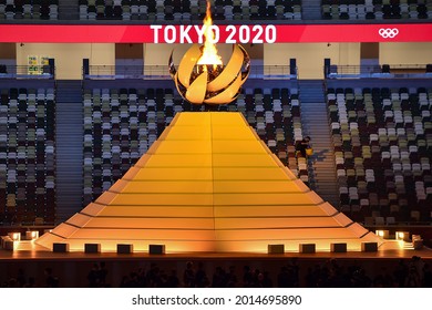 TOKYO, JAPAN - JULY 23, 2021: The Olympic Flame is seend during the Opening Ceremony of the Tokyo 2020 Olympic Games at the Olympic Stadium in Tokyo.