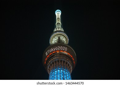 Tokyo, Japan - July 29, 2019: The skytree tower is illuminated at night announcing the olympics of Tokyo 2020 with a hashtag.