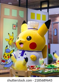 Tokyo, Japan - July 30, 2022 - Pikachu Performance The Pokemon Cafe In Nihonbashi, An Actor In A Costume Is Greeting The Customers