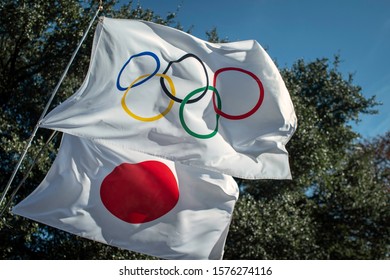 Tokyo, Japan - June 1 2019: 2020 Summer Olympics Rings Logo With National Japan Country Flag