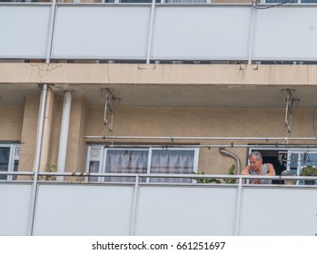 TOKYO, JAPAN - JUNE 15TH 2017. An Elderly Japanese Man In His Apartment Balcony. Japan Aging Population Is Purported To Have The Highest Proportion Of Elderly Citizens Compared To Other Countries.