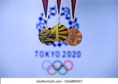 TOKYO, JAPAN, JUNE. 20. 2019: Summer Olympic Game, Tokyo 2020, Logo Of The Games And Medal – Gold, Silver And Bronze