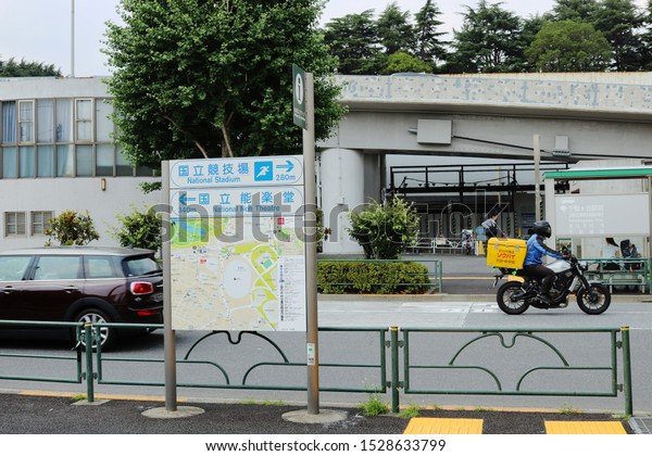 TOKYO, JAPAN - June 21, 2019: A map in a street in
Sendagaya near Kokuritsu-Kyogijo Subway Station and the new
National Stadium, the athletics venue in the Tokyo Olympics. Some
motion blur.