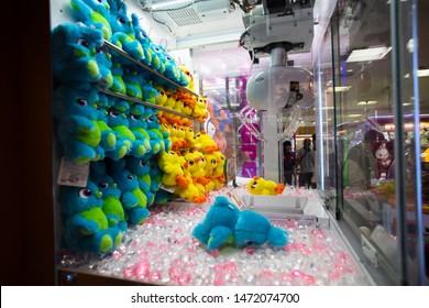 Tokyo, Japan - June 26, 2019: UFO Toy Claw Crane Catcher Game Vending Machines At A Game Center In Shinjuku With Bird Plush Toys