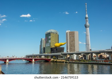 Tokyo, Japan – March 11, 2020 – View of the Sumida Ward with Sumida City Office, Tokyo Skytree Tower and Asahi Breweries headquarters from across the Sumida River in Asakusa, Tokyo