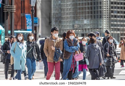 Tokyo, Japan, March 2020 - Pedestrians In Tokyo City During Covid19 Pandemic.