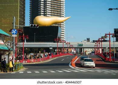 Tokyo, Japan - March 22, 2016 : Asahi Beer Hall. It is one of the buildings of the Asahi Breweries headquarters in Sumida, Tokyo. It was designed by French designer Philippe Starck.