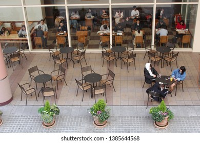 TOKYO, JAPAN - March 27, 2019: Overhead View Of The Interior And Exterior Of A Starbucks Coffee Shop In Tokyo's Koto Ward.