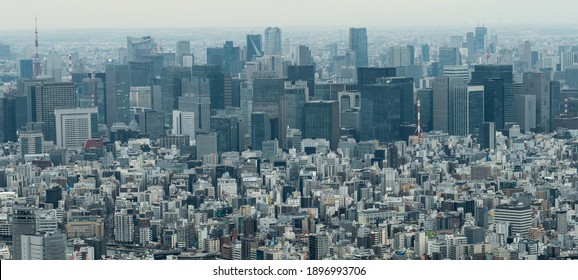 Tokyo, Japan - March 29 2019: Panoramic view of skyscrapers in Tokyo with low-rise buildings in the foreground