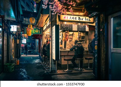 TOKYO, JAPAN - MARCH 30, 2019:  Food stall in Omoide Yokocho, near Shinjuku station, Tokyo, Japan.