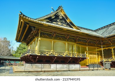 Tokyo, Japan – March 5, 2020 - Side view and golden details of the honden part of the Ueno Tosho-gu Shinto shrine located in the Taito ward of Tokyo