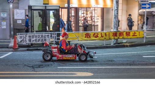 TOKYO, JAPAN - MAY 18TH 2017. Rental Go Karts In Shibuya Street. Driving A Go Kart In Public Street Offer People The Chance To Go Through Tokyo’s Busy Streets And Is A Popular Activity With Tourists.
