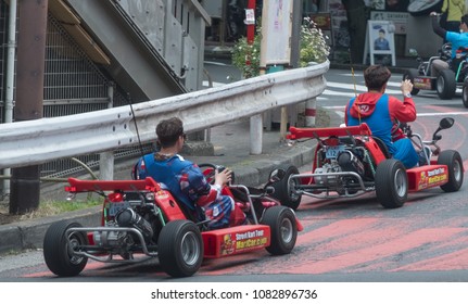 TOKYO, JAPAN - MAY 1ST, 2018. Tourists Driving Rented Go Kart In The Street Of Shibuya