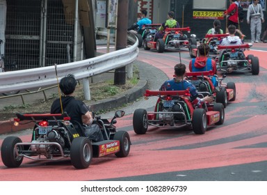 TOKYO, JAPAN - MAY 1ST, 2018. Tourists Driving Rented Go Kart In The Street Of Shibuya