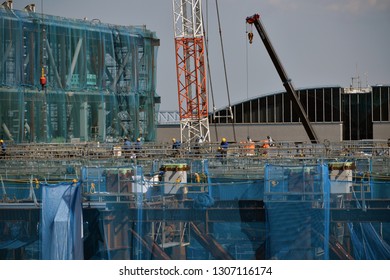 Tokyo, Japan - May, 2018: Workers Building Tokyo Olympic Village