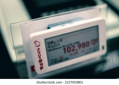 Tokyo, Japan - May, 2022: Close Up Price Tag Of Camera Lens Being Sold At Japanese Electronic Department Store