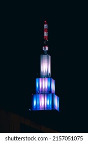 Tokyo, Japan - May, 2022: Colorful Illuminated NTT Docomo Yoyogi Building After Dark. Neon City And Futuristic Urban Concept.