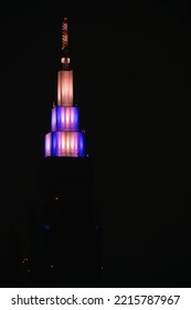 Tokyo, Japan - May, 2022: Colorful Illuminated NTT Docomo Yoyogi Building After Dark. Neon City And Futuristic Urban Concept.