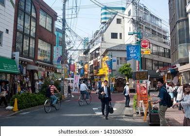 Tokyo, Japan - May 25, 2014:
Street Scene In Shimokitazawa, The Neighbourhood Is Well Known For The Density Of Small Independent Fashion Retailers, Cafes, Theaters, Bars And Live Music Venues.