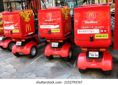 TOKYO, JAPAN - May 4, 2022: Row of McDonalds delivery scooters at a McDonalds restaurant in Tokyo's Edogawa Ward.