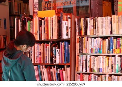 TOKYO, JAPAN - May 5, 2022: Books Diplayed Outside A Used Bookstore In Tokyo's Jinbocho Area.